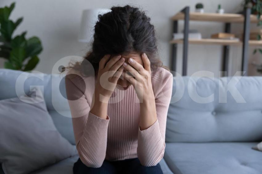 unhappy young caucasian woman